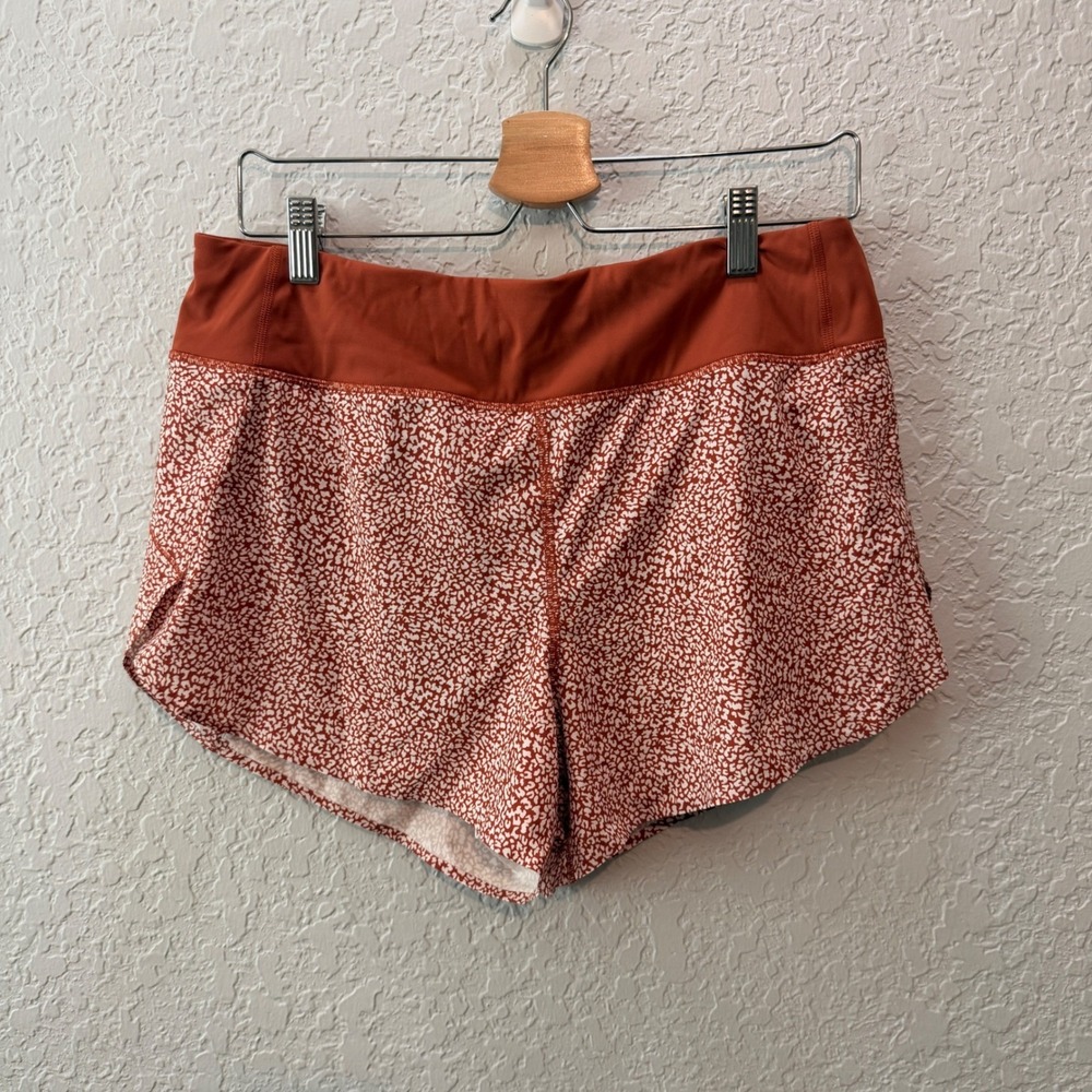 Athleta Run With It 3.5 Printed Short Size M Orange Animal Print Activewear